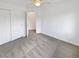 Carpeted bedroom features a ceiling fan and closet and doorway to another room at 2180 Trailblazer Way, Castle Rock, CO 80109