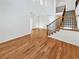 Spacious living room with high ceilings, staircase, and hardwood flooring at 2180 Trailblazer Way, Castle Rock, CO 80109