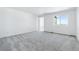 Spacious bedroom with carpet flooring and a view at 9324 Quartz St, Arvada, CO 80007