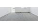 View of the carpeted bedroom, with white walls, trim, and windows at 9324 Quartz St, Arvada, CO 80007
