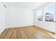 Bright bedroom with hardwood floors and large windows at 9324 Quartz St, Arvada, CO 80007