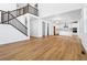 Bright living room with hardwood floors, high ceilings, and a fireplace at 9324 Quartz St, Arvada, CO 80007