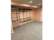 Spacious unfinished basement area with shelving, offering flexible storage options at 16341 Maple Rock Ct, Parker, CO 80134