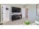 This living room features great natural lighting, a TV, and access to a closet and doors at 4108 Estrella St, Brighton, CO 80601