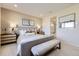 This primary bedroom features recessed lighting, and calming decor to create a relaxing retreat at 4108 Estrella St, Brighton, CO 80601