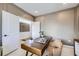 Well-appointed home office with a modern desk, ample storage, and neutral tones, creating a productive workspace at 4108 Estrella St, Brighton, CO 80601