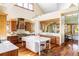 Gourmet kitchen with stainless steel appliances, center island, and custom cabinetry at 5101 Saint Vrain Rd, Longmont, CO 80503