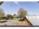 Picturesque view of the estate, including the main house and outbuildings against a sunny sky at 5101 Saint Vrain Rd, Longmont, CO 80503