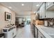 Well-maintained kitchen provides seamless access to the dining and living areas at 14390 E Marina Dr # 403, Aurora, CO 80014