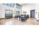 Welcoming dining area with large windows, ample seating, and modern decor at 1825 Spaulding Cir, Superior, CO 80027