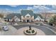 Stunning exterior view of the community clubhouse with a lush green roof and elegant entry fountain at 1825 Spaulding Cir, Superior, CO 80027