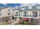 Beautiful townhome with brick accents, outdoor patio and quaint landscaping creates a comfortable living space at 1825 Spaulding Cir, Superior, CO 80027