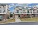 Townhouse with inviting balconies, an attached garage and a manicured lawn, perfect for outdoor relaxation at 1825 Spaulding Cir, Superior, CO 80027