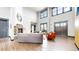 Warm lounge featuring a stone fireplace, plush seating, and stylish decor at 1825 Spaulding Cir, Superior, CO 80027