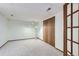 Spacious basement with neutral carpet and a large closet, offering ample storage space at 8820 W 80Th Dr, Arvada, CO 80005