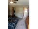 Bedroom with carpet and closet and 3 open doors to other rooms at 292 S Pembrook St, Castle Rock, CO 80104