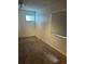 Small carpeted bedroom with window and closet, creating a simple and functional space at 292 S Pembrook St, Castle Rock, CO 80104