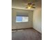 Bright bedroom with a ceiling fan and a large window offering ample natural light at 292 S Pembrook St, Castle Rock, CO 80104