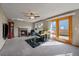Comfortable living room featuring a fireplace, plush seating, and sliding door to backyard at 292 S Pembrook St, Castle Rock, CO 80104