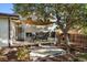Spacious back deck is shaded with a large sun shade perfect for entertaining at 5060 W 71St Pl, Westminster, CO 80030
