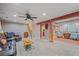 Finished basement area with access to a laundry room and staircase access to the main level at 5060 W 71St Pl, Westminster, CO 80030