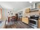 Open kitchen with stainless steel appliances and eat-in dining, perfect for Gathering gatherings at 1395 S Kendall St, Lakewood, CO 80232