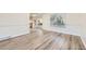 Bright and airy living room with hardwood floors and large windows at 11892 Vallejo St, Denver, CO 80234