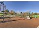 Community playground featuring slides, climbing structures, and a covered picnic area at 11892 Vallejo St, Denver, CO 80234