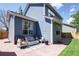 Backyard featuring a patio with outdoor seating and a built-in fire pit at 13777 W Amherst Way, Lakewood, CO 80228