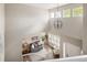 Sun-filled living room with large windows, a comfy couch, and stylish decor at 13777 W Amherst Way, Lakewood, CO 80228