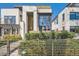 Well-maintained two-story house featuring a blend of stone and wood textures at 427 Milwaukee St, Denver, CO 80206