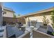 Outdoor kitchen area with grill, built-in counter space and ample seating at 427 Milwaukee St, Denver, CO 80206