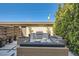 Outdoor kitchen area with grill, built-in counter space and ample seating at 427 Milwaukee St, Denver, CO 80206
