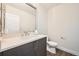 Tastefully designed powder room with sleek vanity, modern fixtures and an elongated toilet at 427 Milwaukee St, Denver, CO 80206