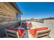 Inviting roof deck with comfortable seating, including a sofa and chairs surrounding a fire pit at 427 Milwaukee St, Denver, CO 80206