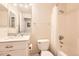 Bright bathroom with vanity, ample storage, and shower and tub combination at 1148 Opal St # 101, Broomfield, CO 80020