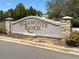 Miramonte Ranch community entrance sign with stone pillars and lush landscaping at 1148 Opal St # 101, Broomfield, CO 80020
