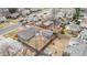 Aerial view showcases a fenced backyard and the neighborhood at 2713 S Hazel Ct, Denver, CO 80236