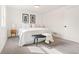 A bright bedroom with neutral accents and a king-size bed at 2713 S Hazel Ct, Denver, CO 80236