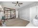 Bedroom with lots of natural light, open doorway, and bookcase at 5420 Baseline Rd, Boulder, CO 80303