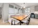 Bright dining room featuring a built-in banquet and large table with seating for ten at 5420 Baseline Rd, Boulder, CO 80303