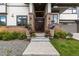 Charming home featuring a stone facade, well-manicured landscaping, and a welcoming entrance at 5420 Baseline Rd, Boulder, CO 80303