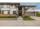Charming home featuring a stone facade, well-manicured landscaping, and a welcoming entrance at 5420 Baseline Rd, Boulder, CO 80303