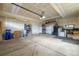 Spacious two-car garage with ample storage space, overhead lighting, and painted drywall at 5420 Baseline Rd, Boulder, CO 80303