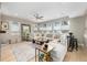 Spacious and modern living room with a large sectional sofa and abundant natural light at 5420 Baseline Rd, Boulder, CO 80303