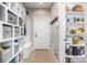 Mudroom with hall tree storage and a large pantry with shelving for plenty of storage at 5420 Baseline Rd, Boulder, CO 80303