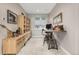 Stylish office with patterned flooring, built-in shelving, and a custom workstation at 5420 Baseline Rd, Boulder, CO 80303