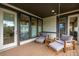 Inviting covered patio with stylish seating, creating a relaxing outdoor living space at 5420 Baseline Rd, Boulder, CO 80303