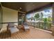 Comfortable covered patio with stylish outdoor furniture and a view of the yard at 5420 Baseline Rd, Boulder, CO 80303
