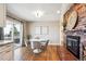 Kitchen dining area with hardwood floors and a view at 13795 W Center Dr, Lakewood, CO 80228